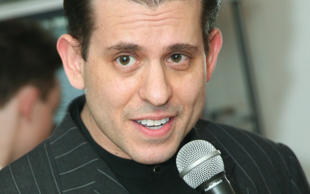 Aaron Sylvan close-up with Microphone