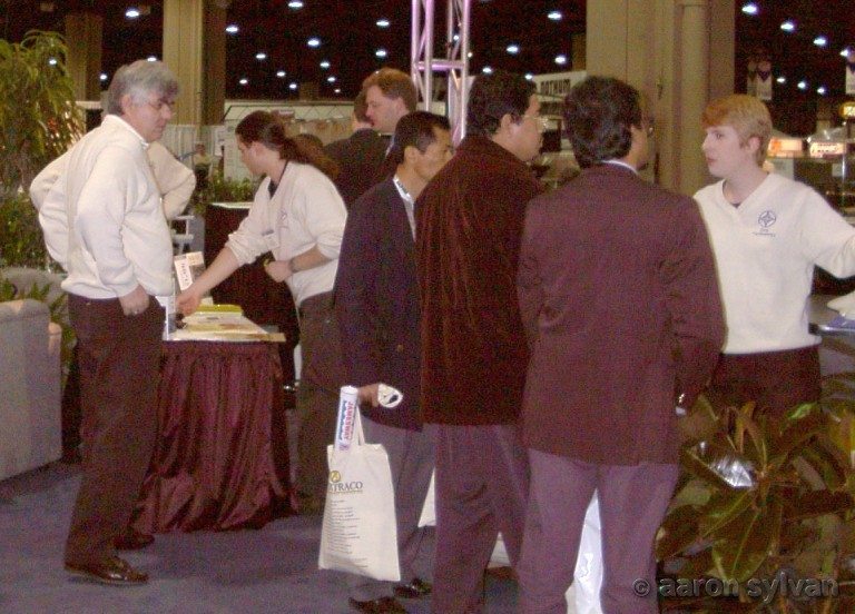 One Technology 2001 International Poultry Expo — software demo by Kim, while Jerry and Aaron are helping customers