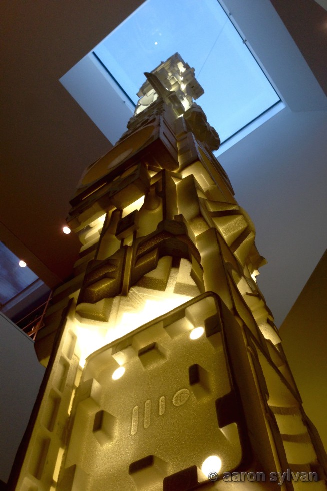 styrofoam sculpture rising through the staircase to the upper floor skylight