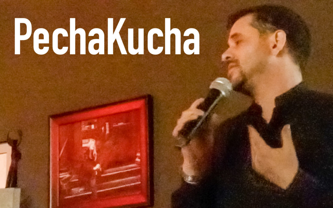 Aaron Sylvan delivering PechaKucha presentation