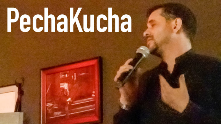 Aaron Sylvan delivering a PechaKucha presentation for Bennington College