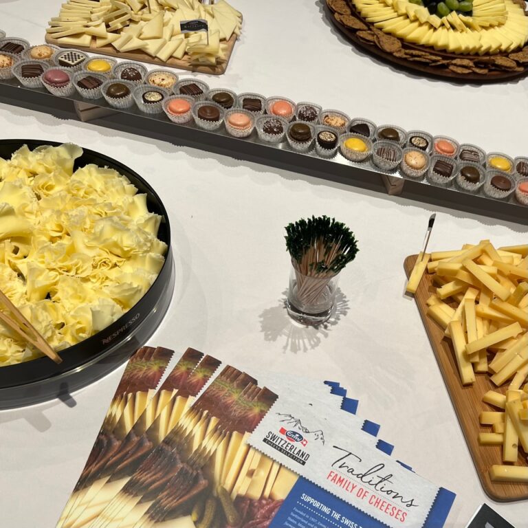 Buffet spread of Swiss cheeses and chocolates